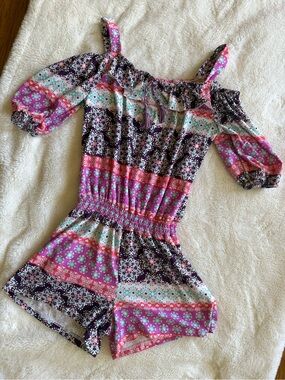 One Step Ahead Pink and Black Off-Shoulder Patterned Romper